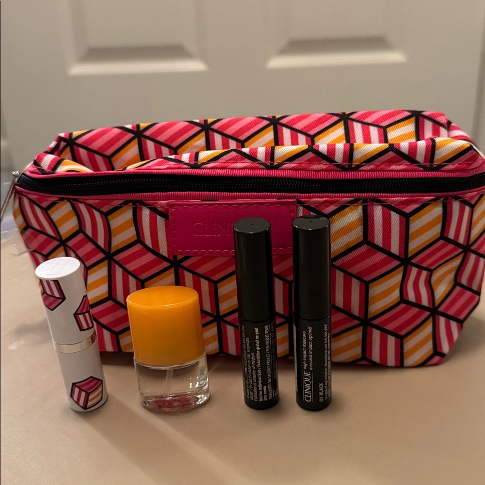 Clinique cosmetic set- 1 bag, 1 happy spray and 1 Pop™ Longwear Lipstick
